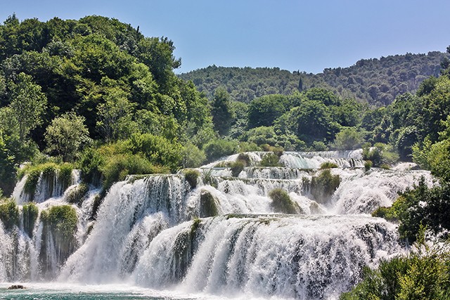 Croatia There is a myriad of lakes and waterfalls at Krka National Park on Day 7 of our guided Delights of the Dalmatian Coast Walk. After a picnic, we’ll explore the tiers of ponds bright with yellow water lilies that shimmer below the mighty Skradinski waterfall.